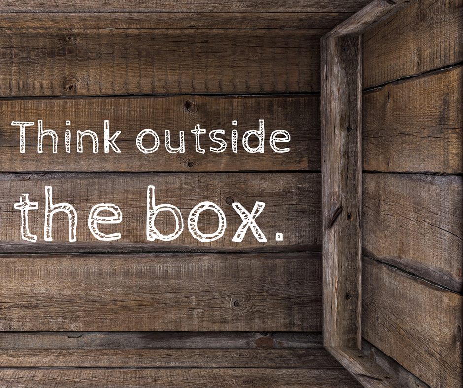 Wooden box says think outside the box